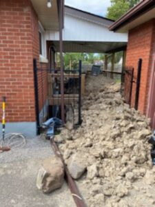 Crowded Basement Exterior needs excavation